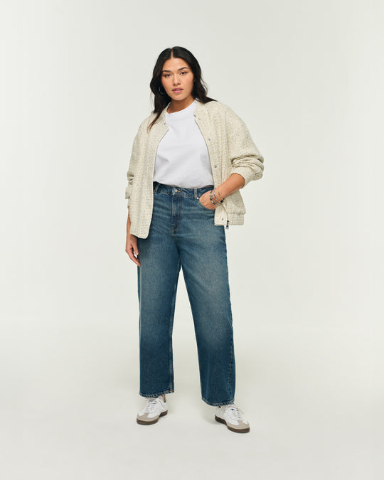 Women's boyfriend jeans, mid-rise, wide leg, dirty wash.